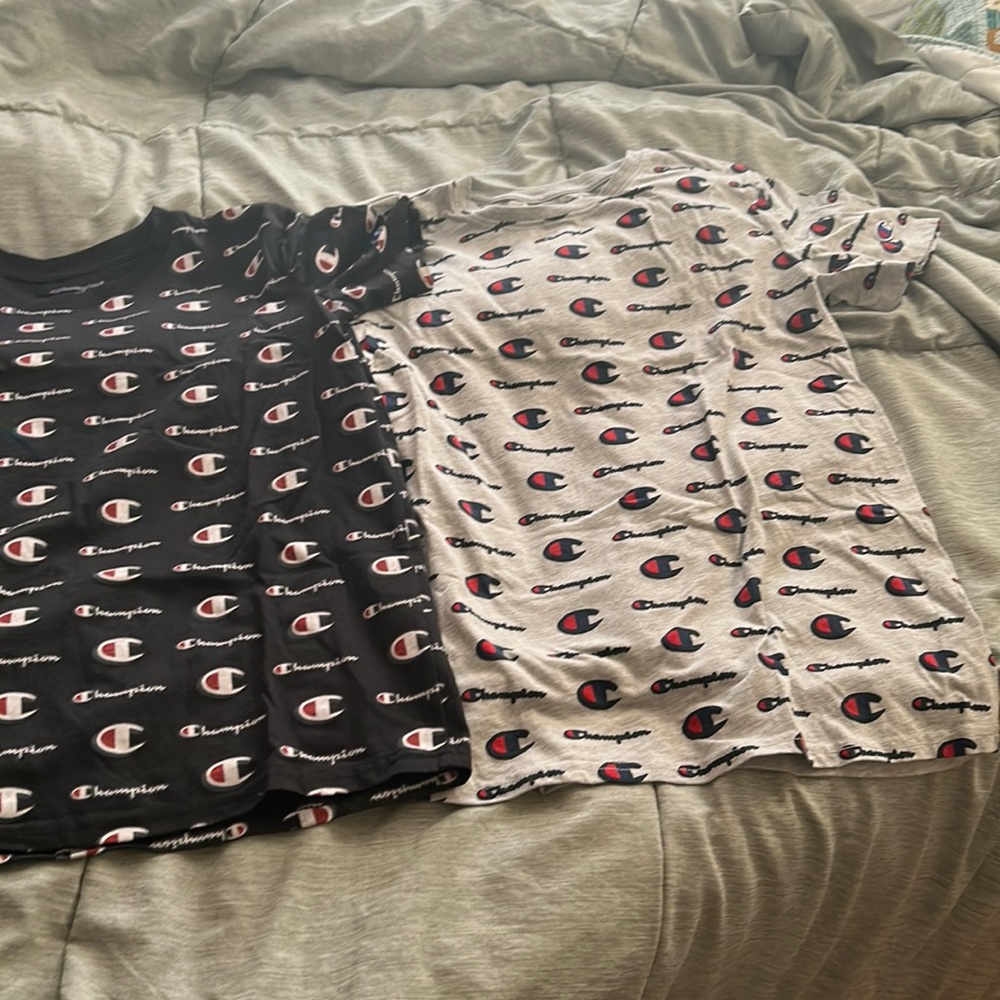 Champion t-shirts one is black and red the other is grey and red